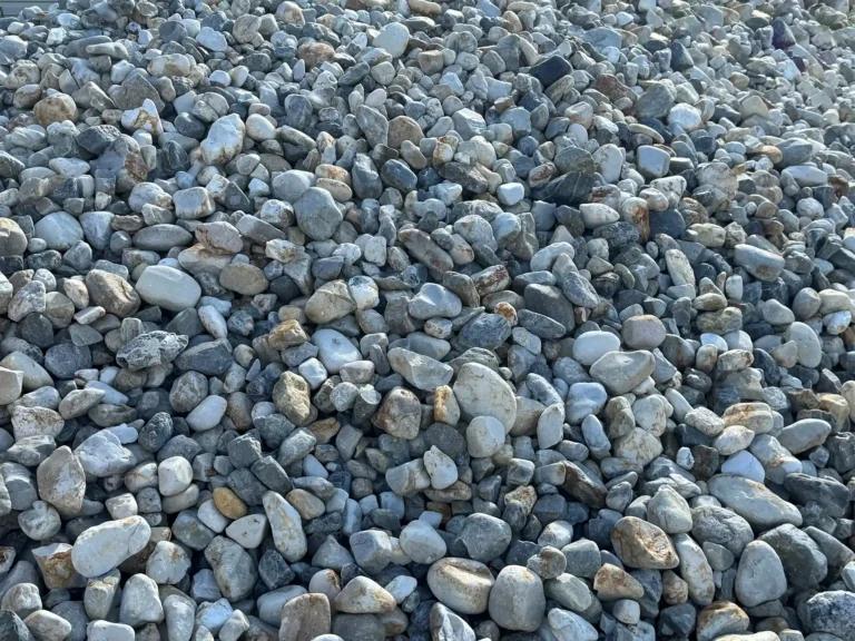 A close-up view of 2/3" Arkansas river rock.